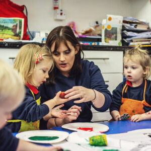 nursery-pupils-teacher-painting